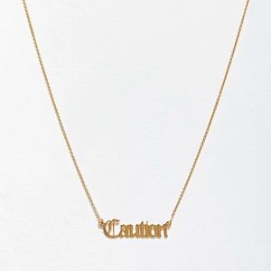 Ryan Porter "Caution" Gold Plates Sterling Silver Necklace | Urban Outfitters
